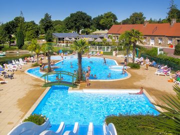 Outdoor pool with four-track slide