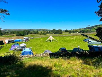 The group camping field with 360 degree views of the Howgill Fells and Holme Fell