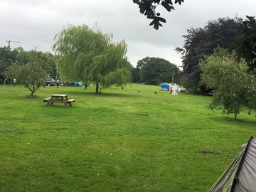 Spacious, green field site with views over countryside. unspoilt scenery.