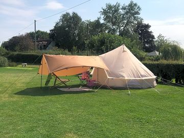 Level grass pitches with 10 amp ehu.