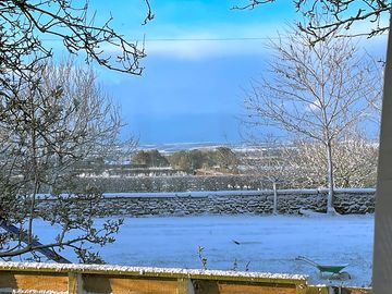 The view south from the living area after a snow shower