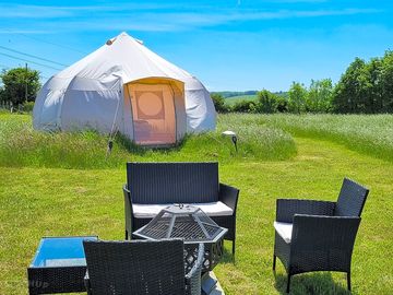 Seating area outside a tent