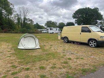 Grass tent pitch