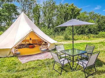 Bell tent with dining area