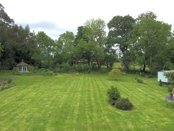 Maximum number of guests in the back garden are two couples or families