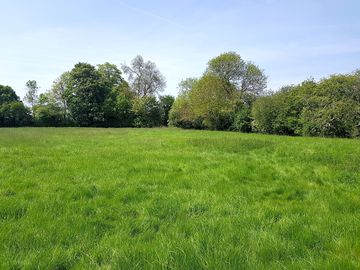 Bordered by open countryside