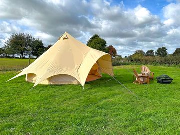 Bell tent with seating and firepit