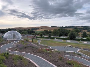 Take a walk through our new gardens with sculptures and the star gazing dome.