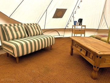 Inside our bell tents, showing a preferred layout.