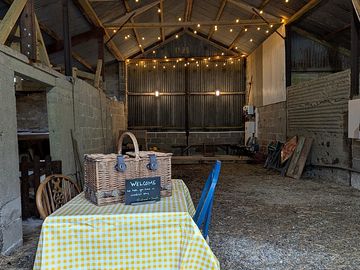 Sheltered hay shed for enjoying a meal or drink.