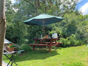 Picnic table by the bell tent