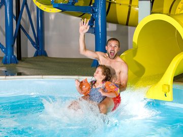 Indoor pool with flume