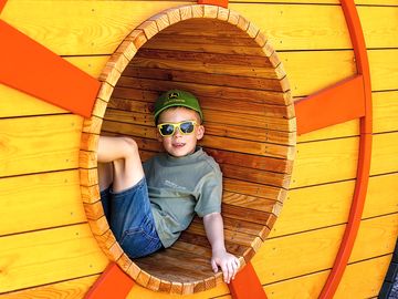 Taking a rest in one of the tractor wheel cubby spaces