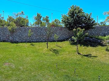 Grass tent pitch