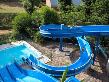 Swimming pool with waterslides