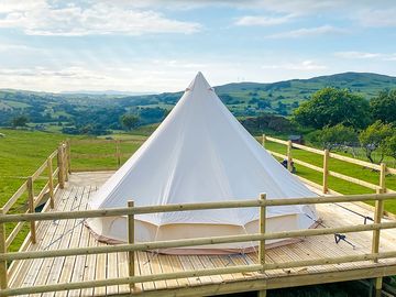 Summers view bell tent on its own decking