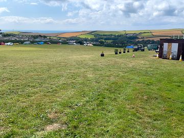 Open field with showers, toilets and washing-up sinks