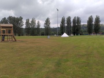 Tents, campervan and touring caravan pitches with electric hookup