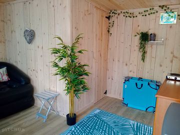 Kitchenette area with deck chairs