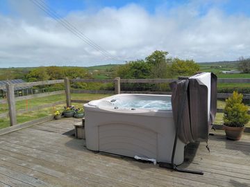 Hot tub on spacious deck