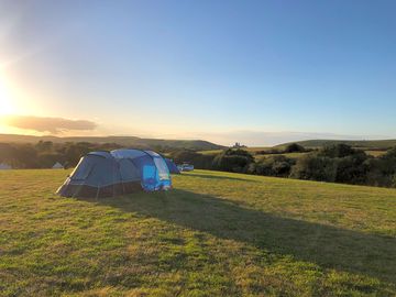 Beautiful sunset over camp site field