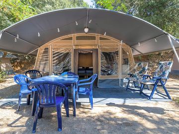 Lodge tent with tables and chairs