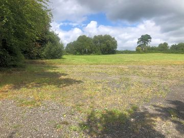 Grass tent and touring pitch field higher