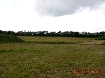 Grass motorhome and tent area