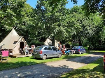 Car parking by the tents