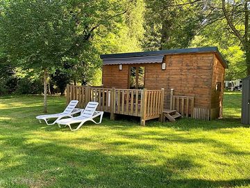 Cottage with decking and seating area