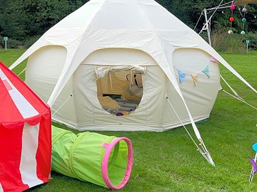 Family with a kids play area set up for their children