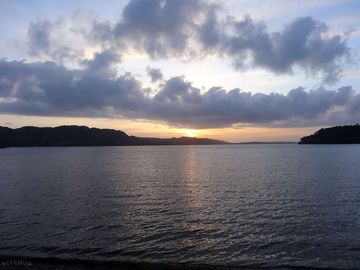 Sunset over the loch, from the site.