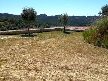 Fully-serviced grass and earth tent or motorhome pitch