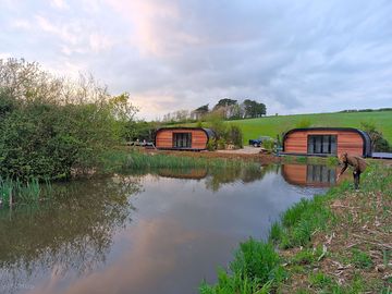 View across the lake to both pods