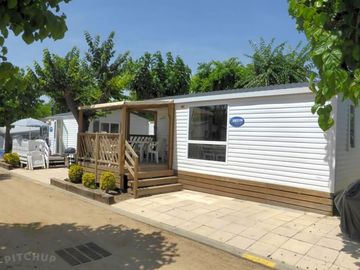 Outside of a chalet 5 mobile home