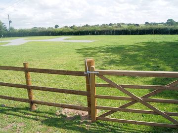 Tranquil site overlooking open countryside