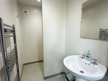 One of our walk in shower rooms with basin