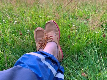 Person unwinding on the grass