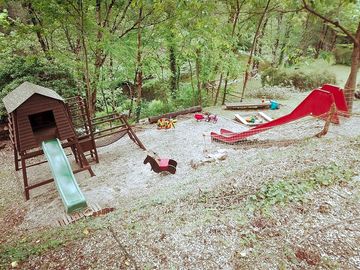Playground surrounded by trees