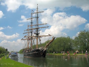 Tall ships fly by along the gloucester-sharpness canal at tudor caravan park