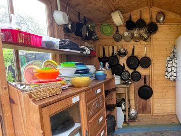 Items in The Kitchen Cupboard, available to all glamping and cabins for outdoor cooking and dining.