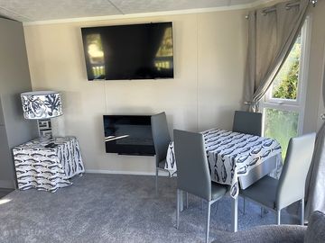 Dining area with flatscreen tv