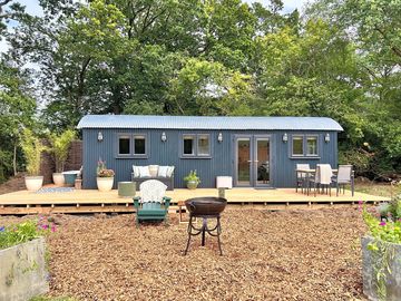 Watch the sun set over the field from this lodge