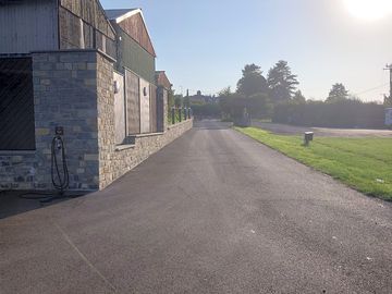 Road down to grass pitches and toilet block