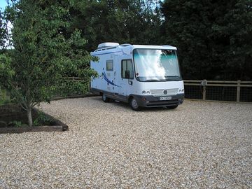 Hardstanding area in a sheltered spot by the fruit and vegetable garden