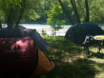 Camping pitches by the river