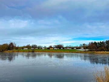 Looking towards the caravan site from the lake