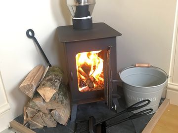 Shepherd's hut very own hobbit wood burner; wood supplied