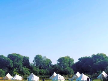 View from the outside of Bell Tent furnished