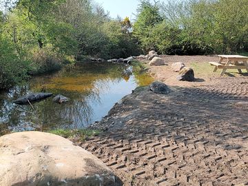 Picnic bench by the river
